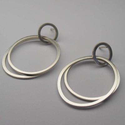 earrings by Yolanda Döpp  :  clean circles modern silver