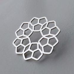Grote zilveren broche.