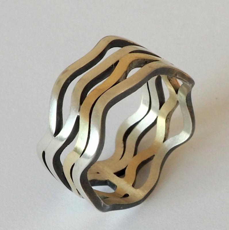 Zilver en gouden Ring. 